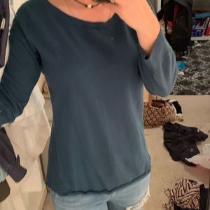 blue/green sweater with open knit sheer back